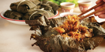 Glutinous Rice with scallops and mushrooms wrapped with Lotus Leaves